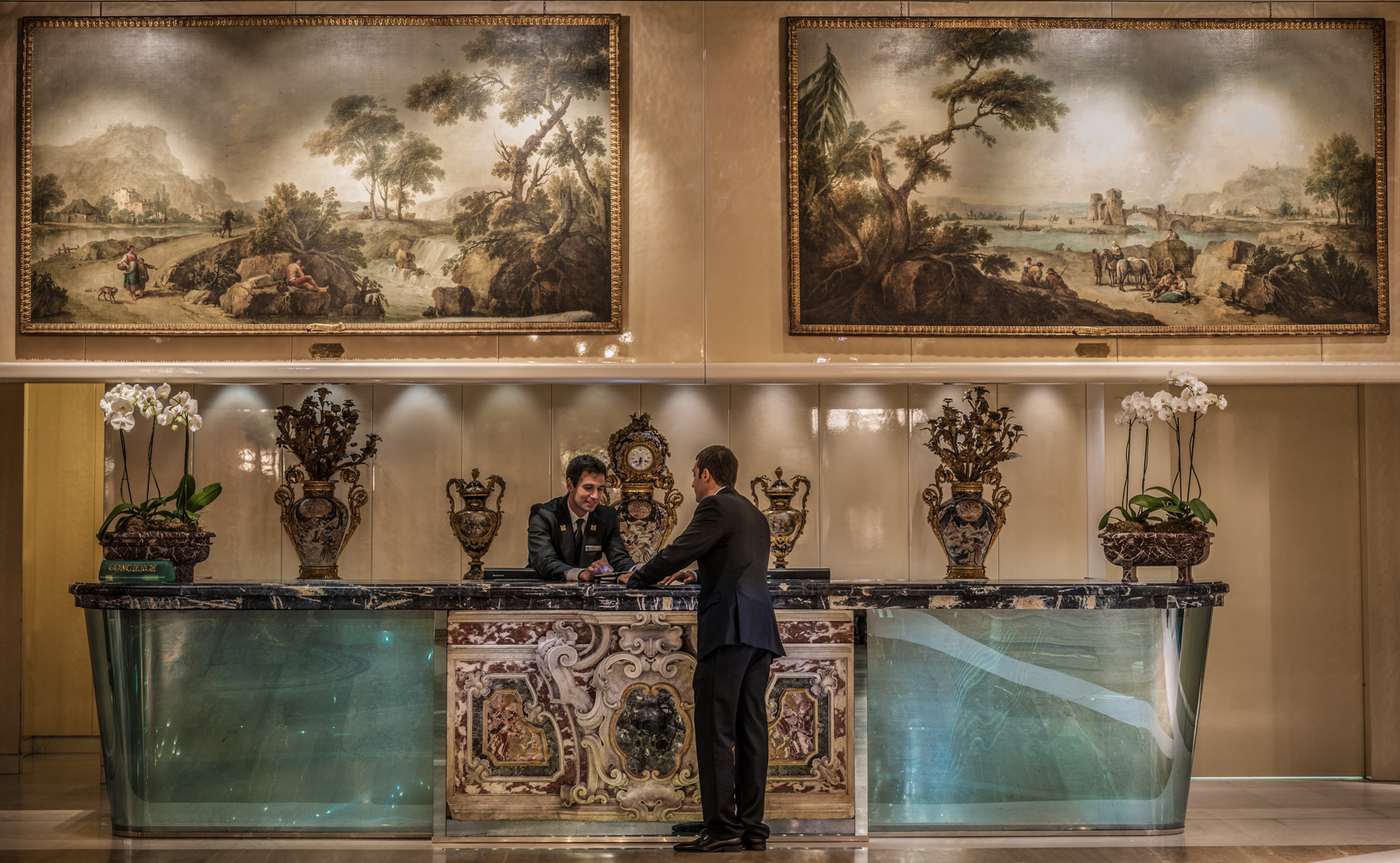 Rome Cavalieri Lobby Entrance - Concierge Desk with Zais Paintings