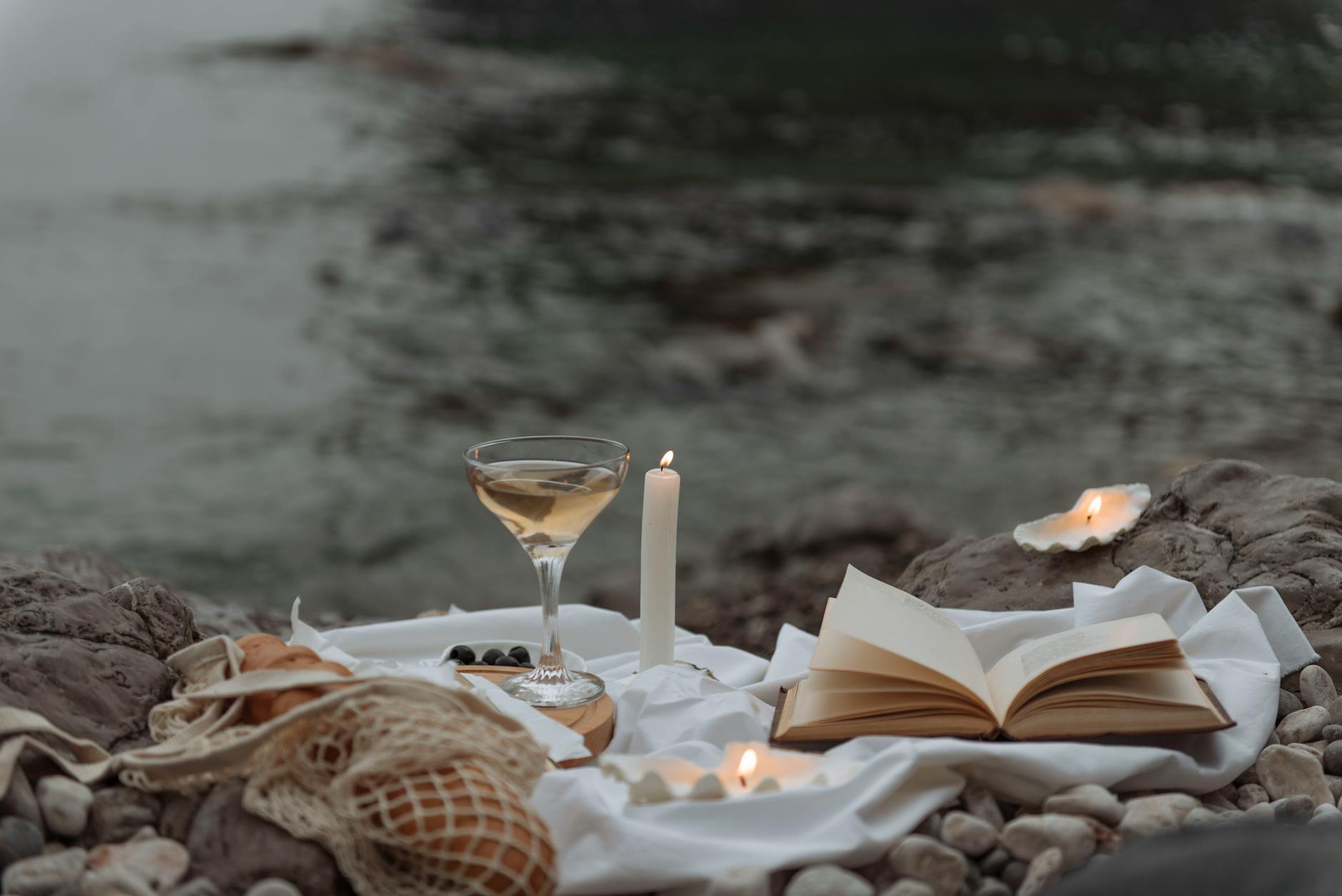 romantic picnic on a rocky beach