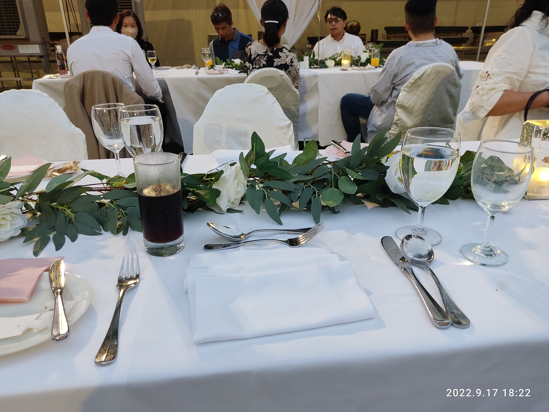 A table laid for guests, the start of a fall dinner party at home