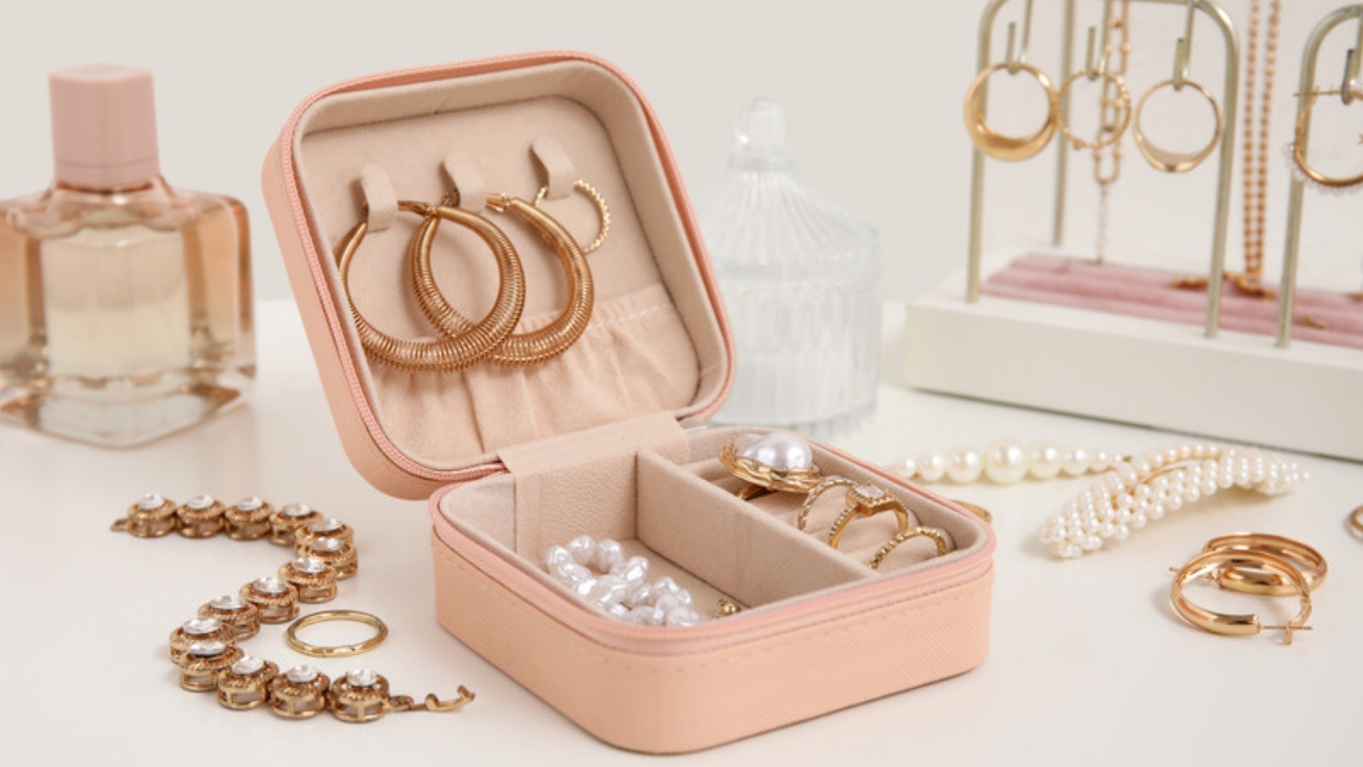 Gold jewelry in a travel jewelry case